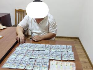 Хоразмда Урганч давлат университети декани 2 600 АҚШ доллар пора олаётган вақтида ушланди