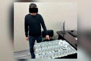 Бўстонлиқда кадастр ходими $5 минг пора билан ушланди