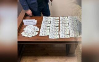 Қорақалпоғистон ва Тошкентда қалбаки долларларни ўтказмоқчи бўлганлар ушланди