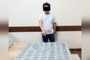Қибрай тумани ҳокимининг ёрдамчиси $10 минг пора билан ушланди