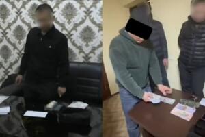 Навоий ва Тошкентда қалбаки доллар савдоси билан шуғулланганлар ушланди