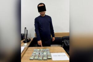 Олий таълим вазирлиги ходими $100 минг пора билан ушланди