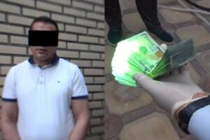 Бухорода туман соғлиқни сақлаш бўлими раҳбари $11,8 минг пора билан ушланди 